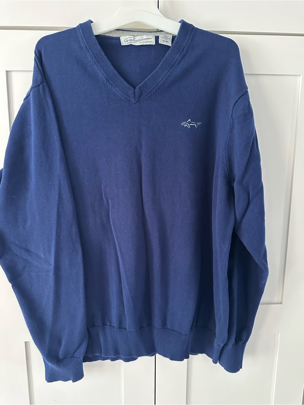 Greg Norman Collection Men's V-Neck Sweater in Navy Blue with Shark Logo